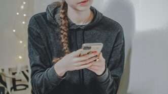 Teen girl on her smartphone | Photo by <a href=%40laurachouettefd59.html Chouette</a> on <a href=woman-in-black-sweater-holding-white-smartphone-vhy5qcb3hiac09e.html   