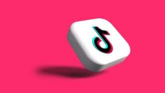Tiktok logo on hot pink background | Photo by <a href=%40rubaitulazade015.html Azad</a> on <a href=a-white-dice-with-a-black-number-on-it-i8nzgv9ajwec09e.html   