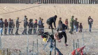 Migrants crossing the U.S.-Mexico border | David Peinado/ZUMAPRESS/Newscom